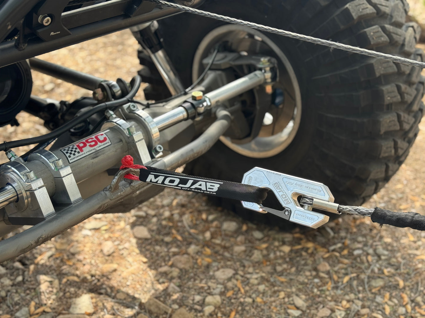 Tiny small soft shackle pulling Jeep