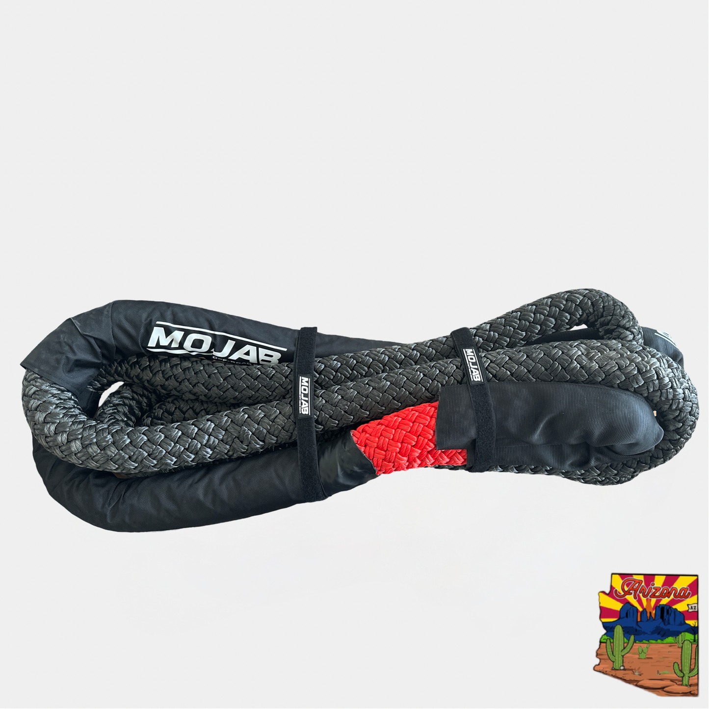 A coiled red and black kinetic rope with 'MOJAB' branding, designed for heavy-duty towing.