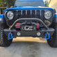 13500 Electric Winch on a blue Jeep with a black bumper and blue recovery hooks on a driveway.
