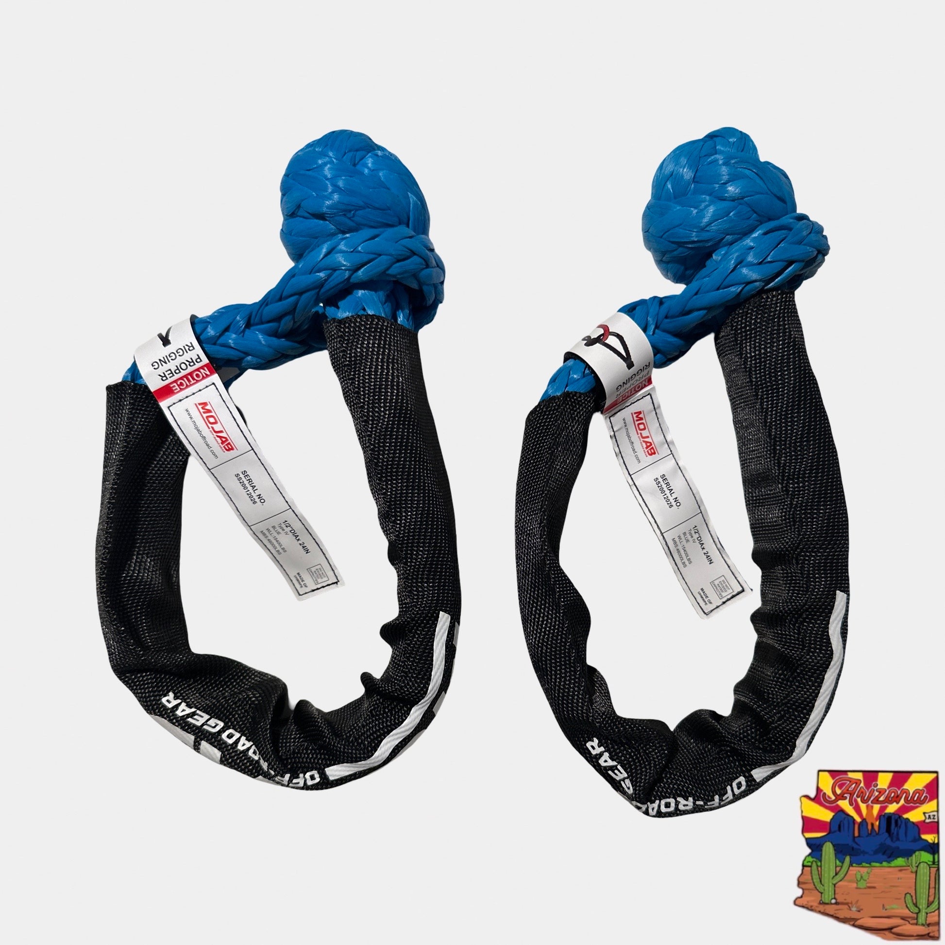 A pair of blue Mojab soft shackle for off-road recovery and towing