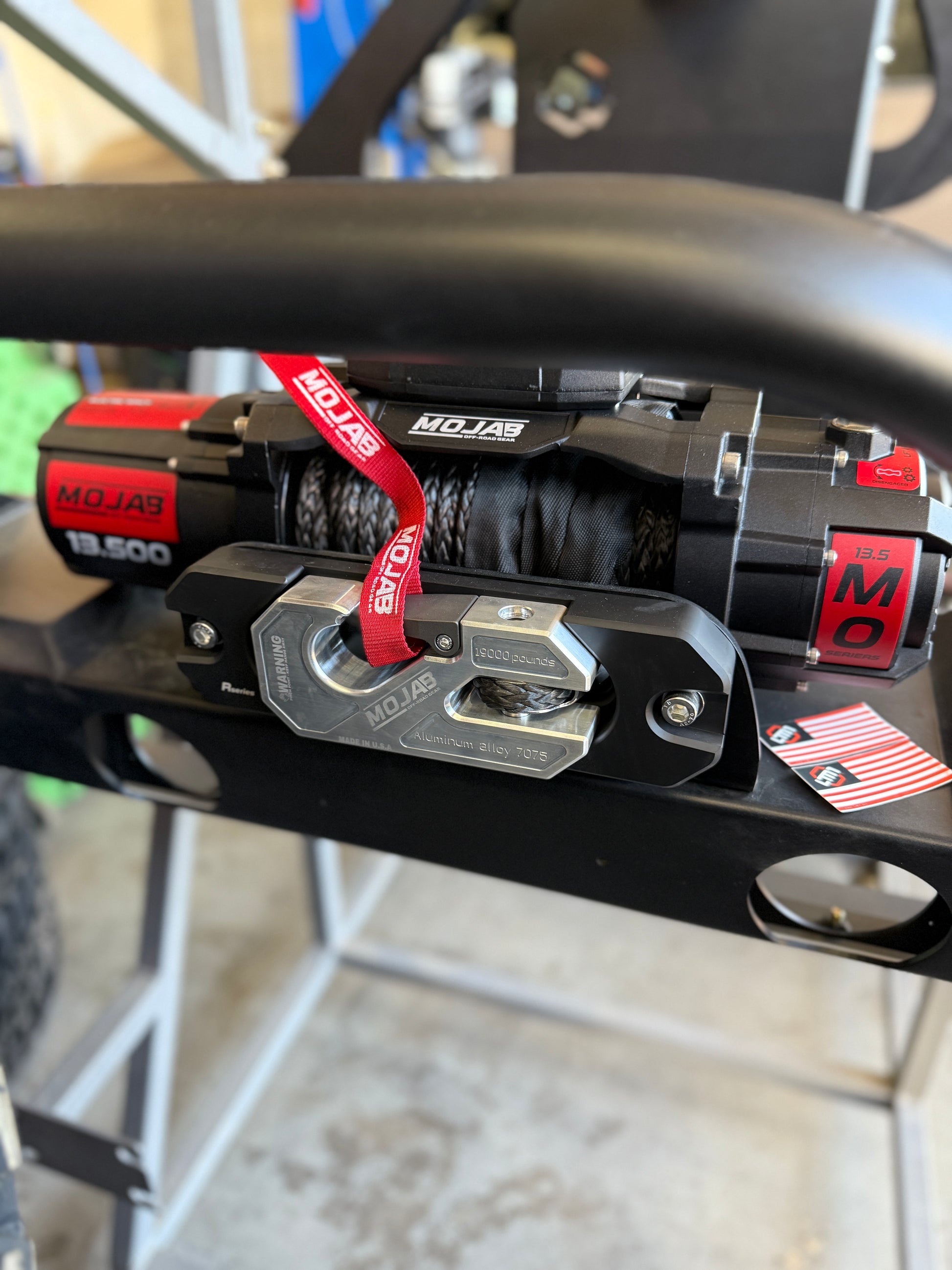 Winch mounted on a buggy with winch shackle